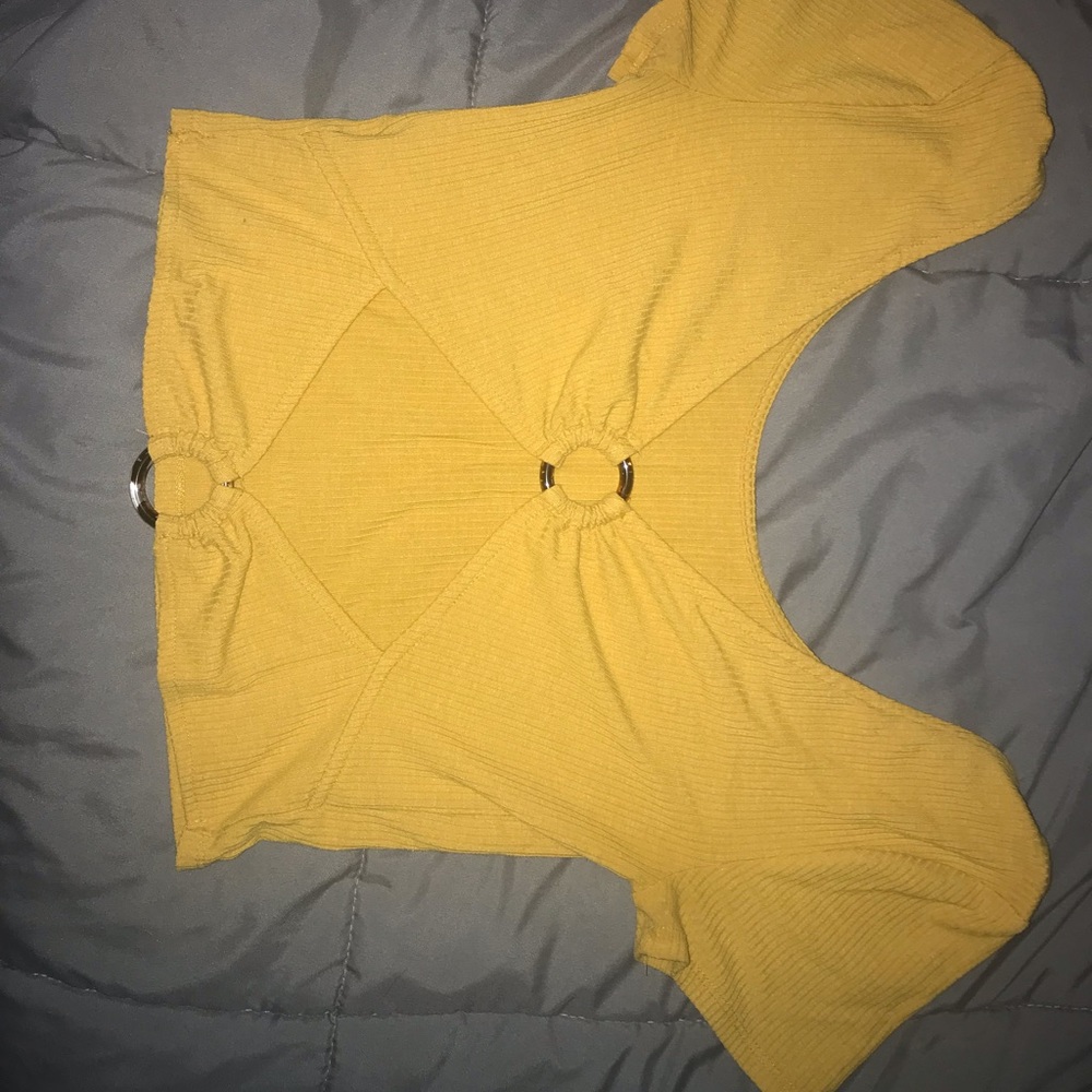 Women’s yellow crop top with rings
